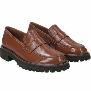 Brown Patent leather. US sizes Never used.